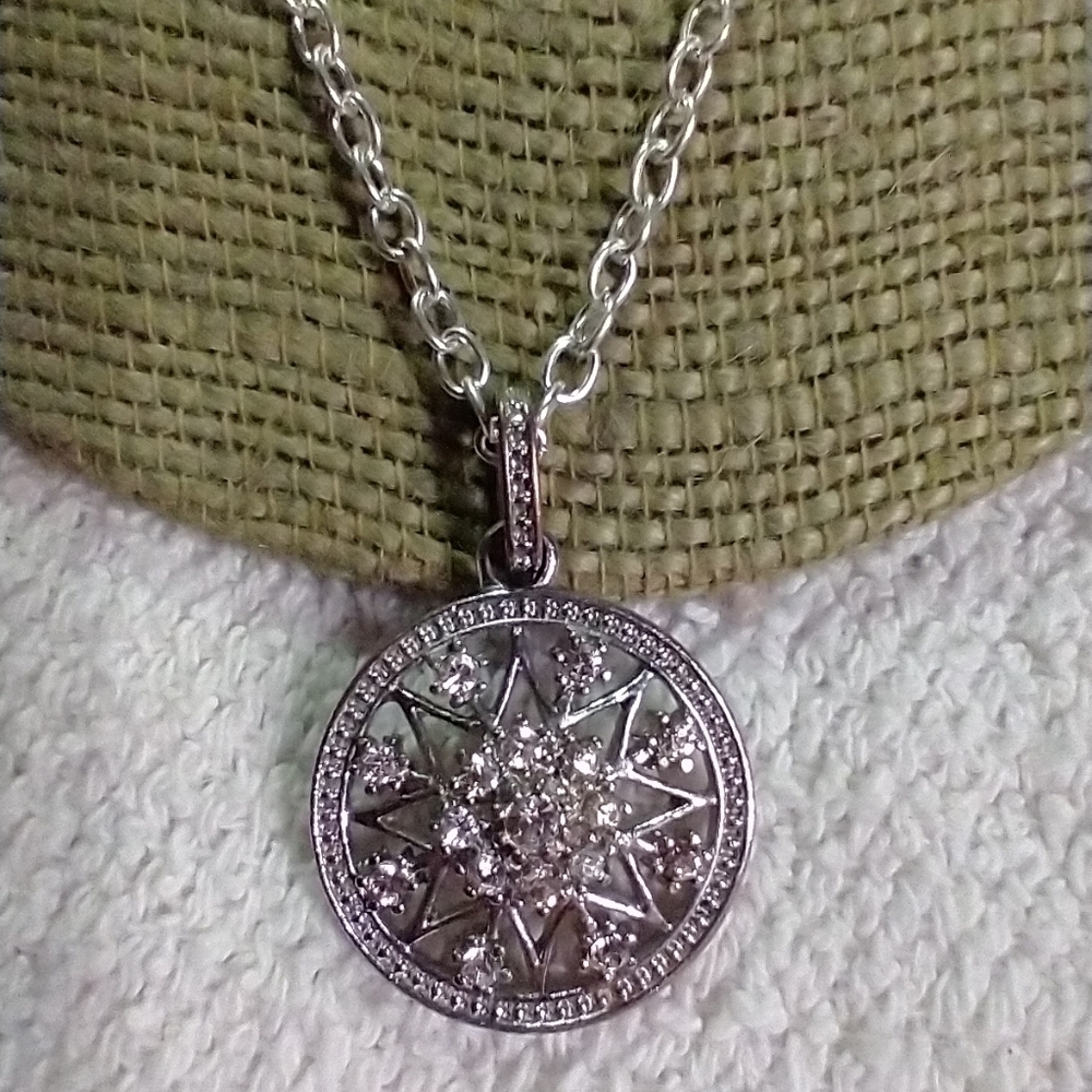 Silvertone crystal star necklace